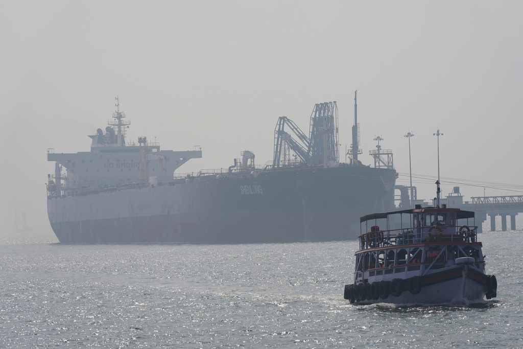 Liberia-flagged tanker Shenlong Suezmax, carrying crude oil from Saudi Arabia, that arrived clearing the Strait of Hormuz, is seen at the Mumbai Port in Mumbai, India, Thursday, March 12, 2026. 