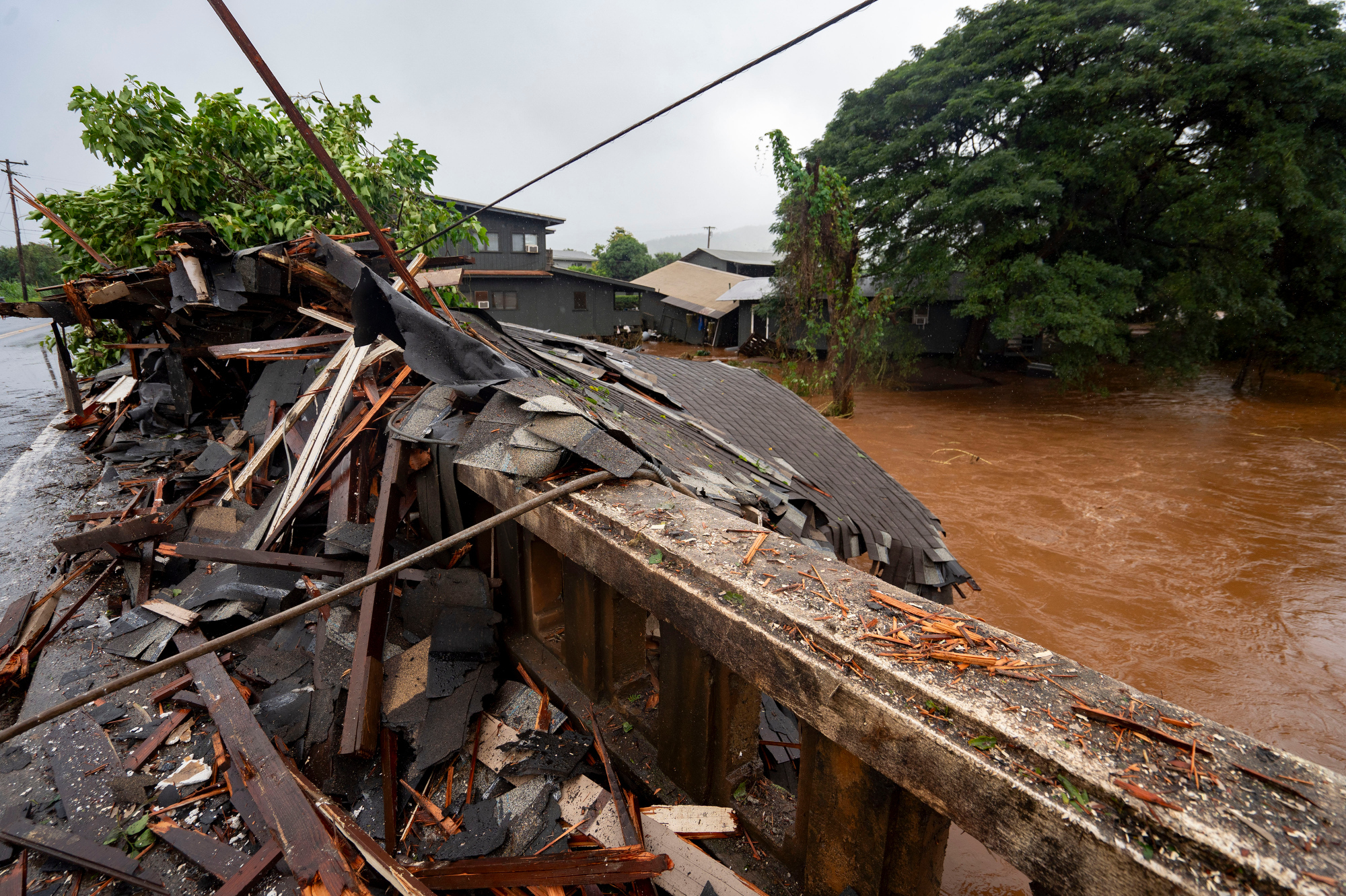 Hawaii’s worst flooding in 20 years threatens dam, prompts evacuations, as more rain looms