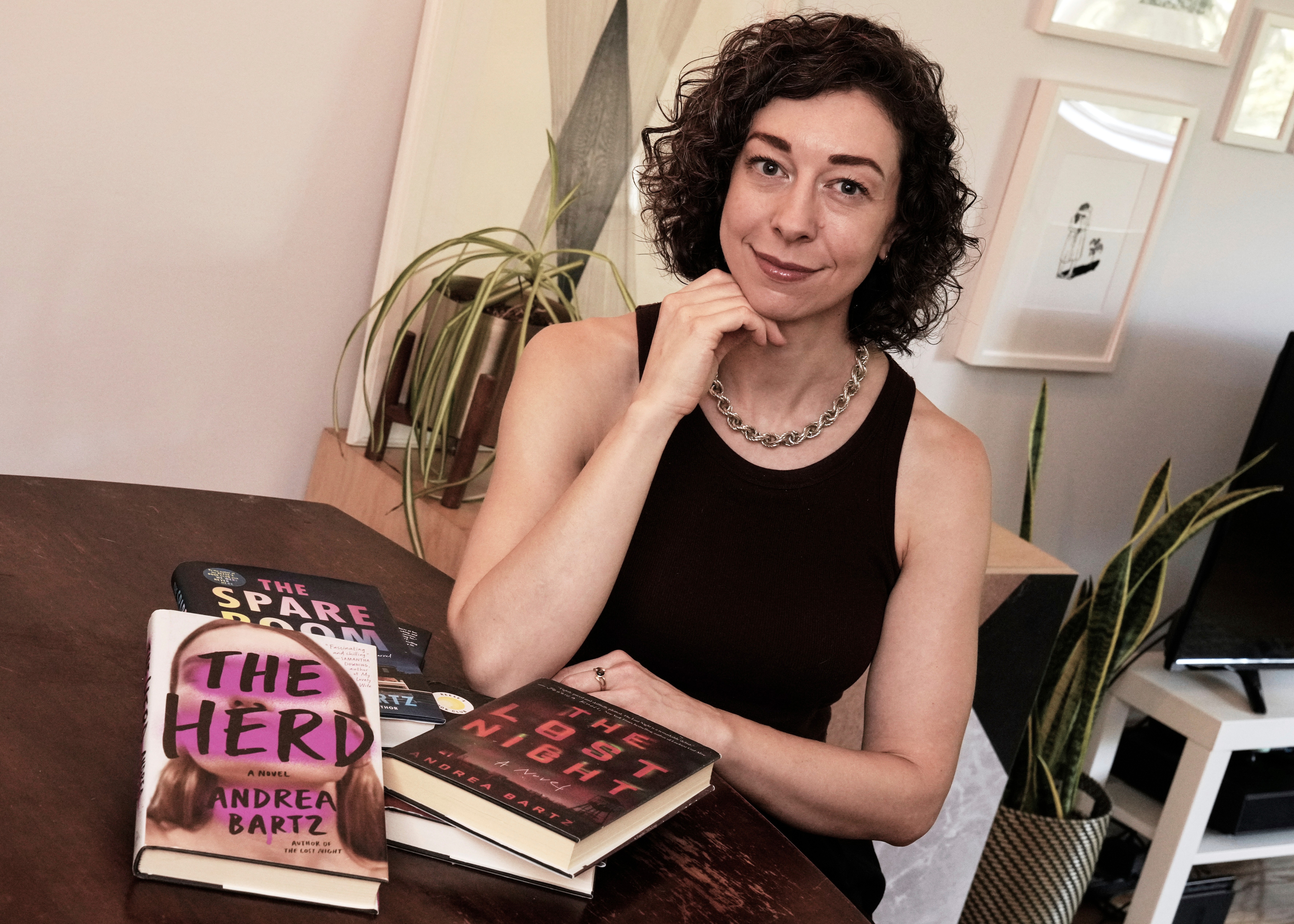 FILE - Thriller novelist Andrea Bartz is photographed in her home, in the Brooklyn borough of New York, Sept. 4, 2025.
