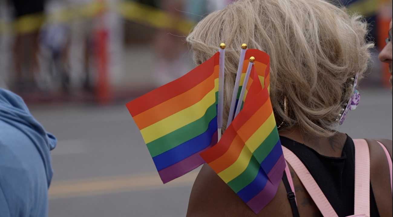 A spectator enjoying Pride Fest in San Diego. 