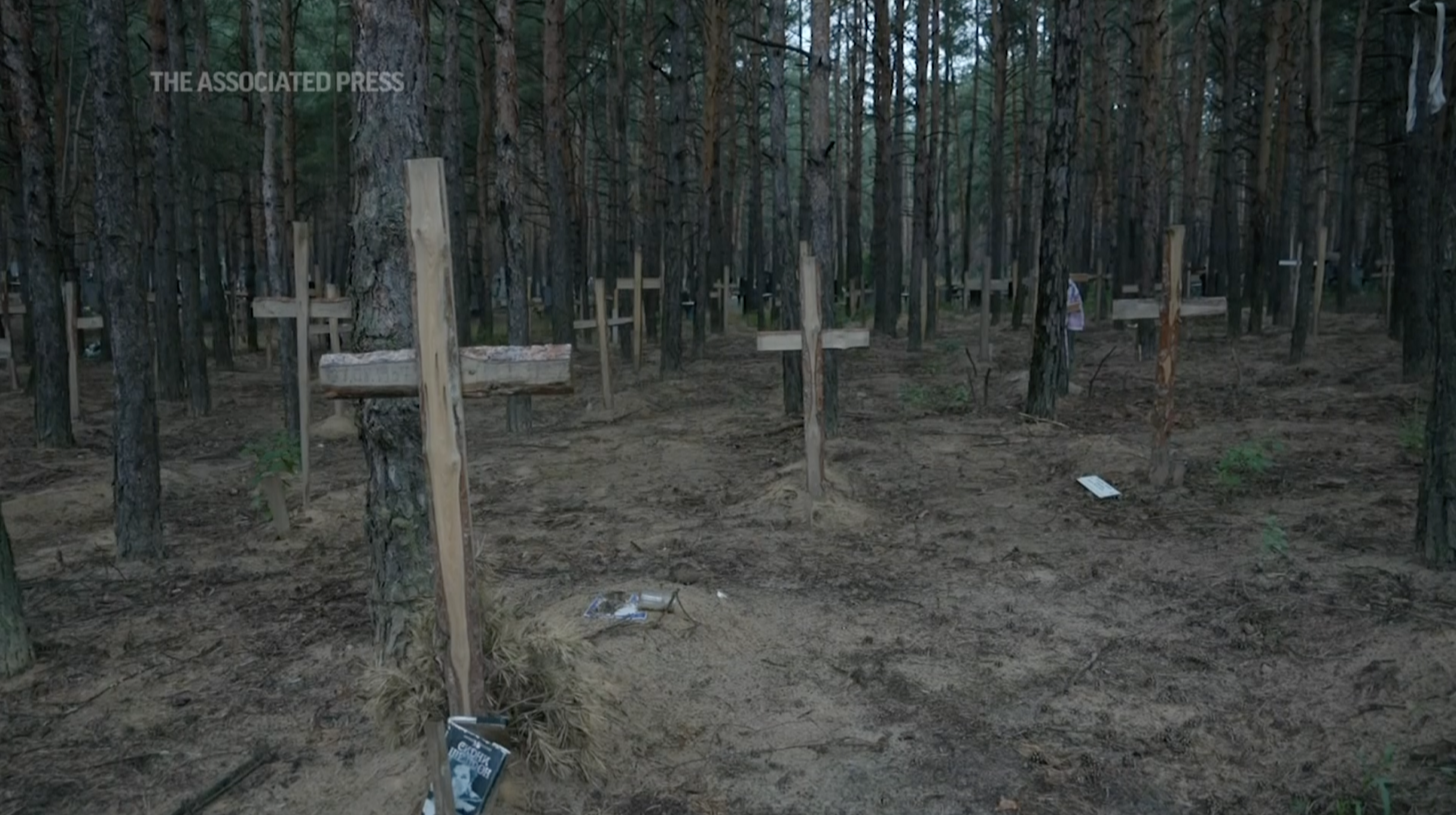 mass grave of Ukrainian soldiers and hundreds of unknown civilians