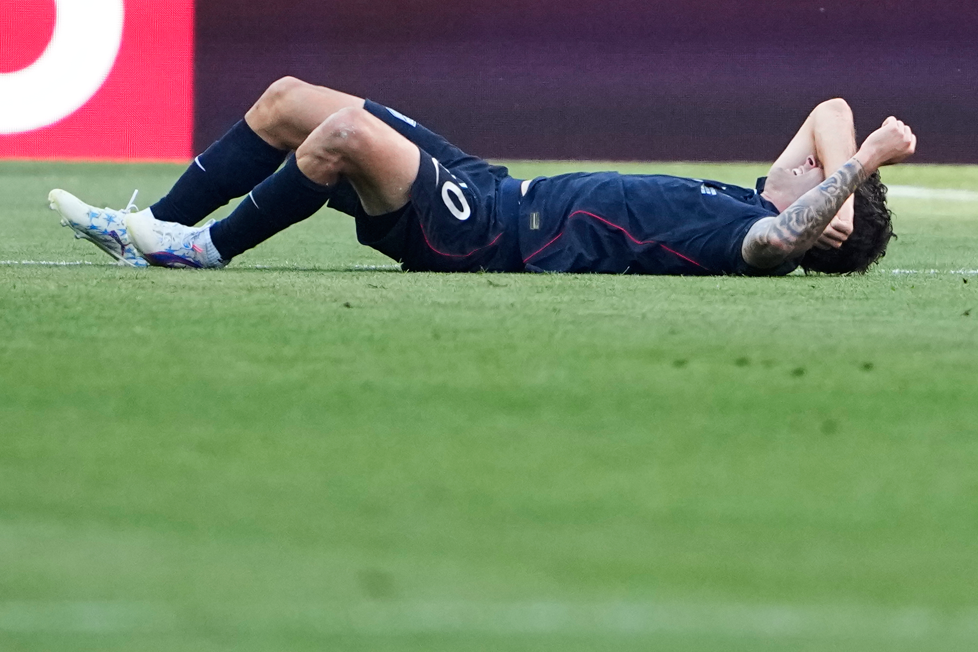 United States' Christian Pulisic (10) reacts during the World Cup round of 16 soccer match between the United States and Belgium in Seattle, Monday, July 6, 2026. 
