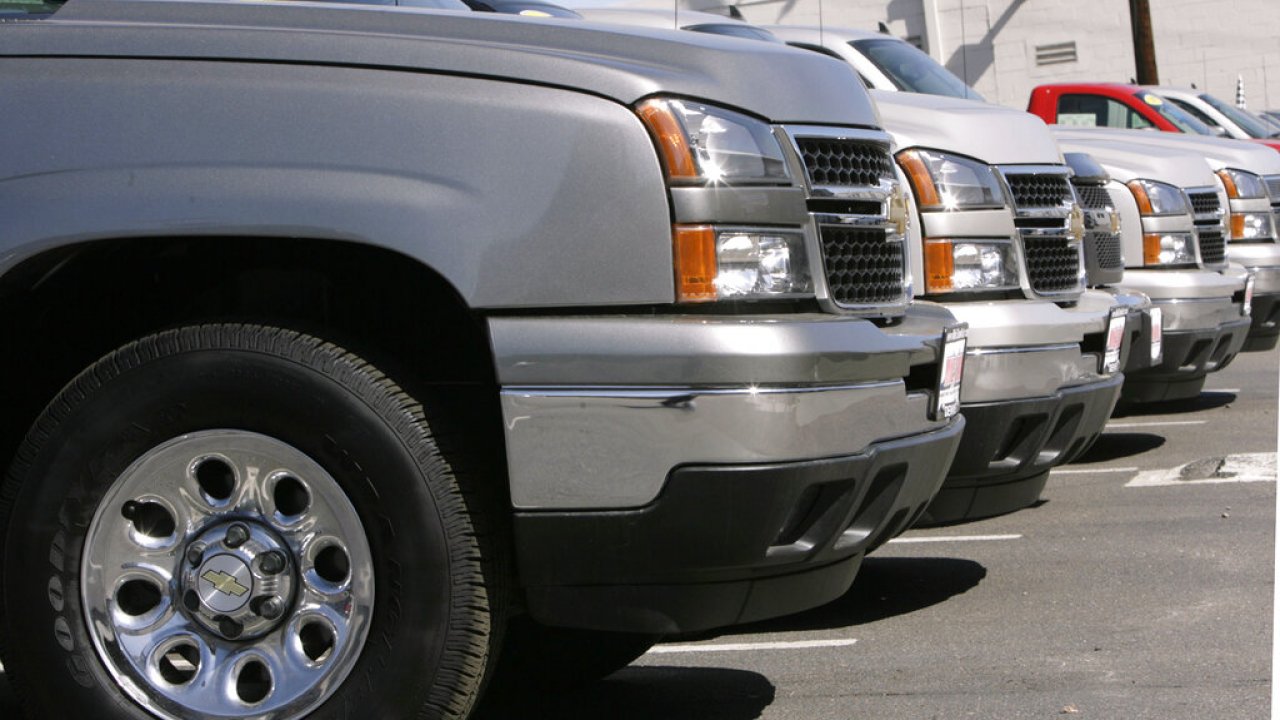 A row of pickup trucks.