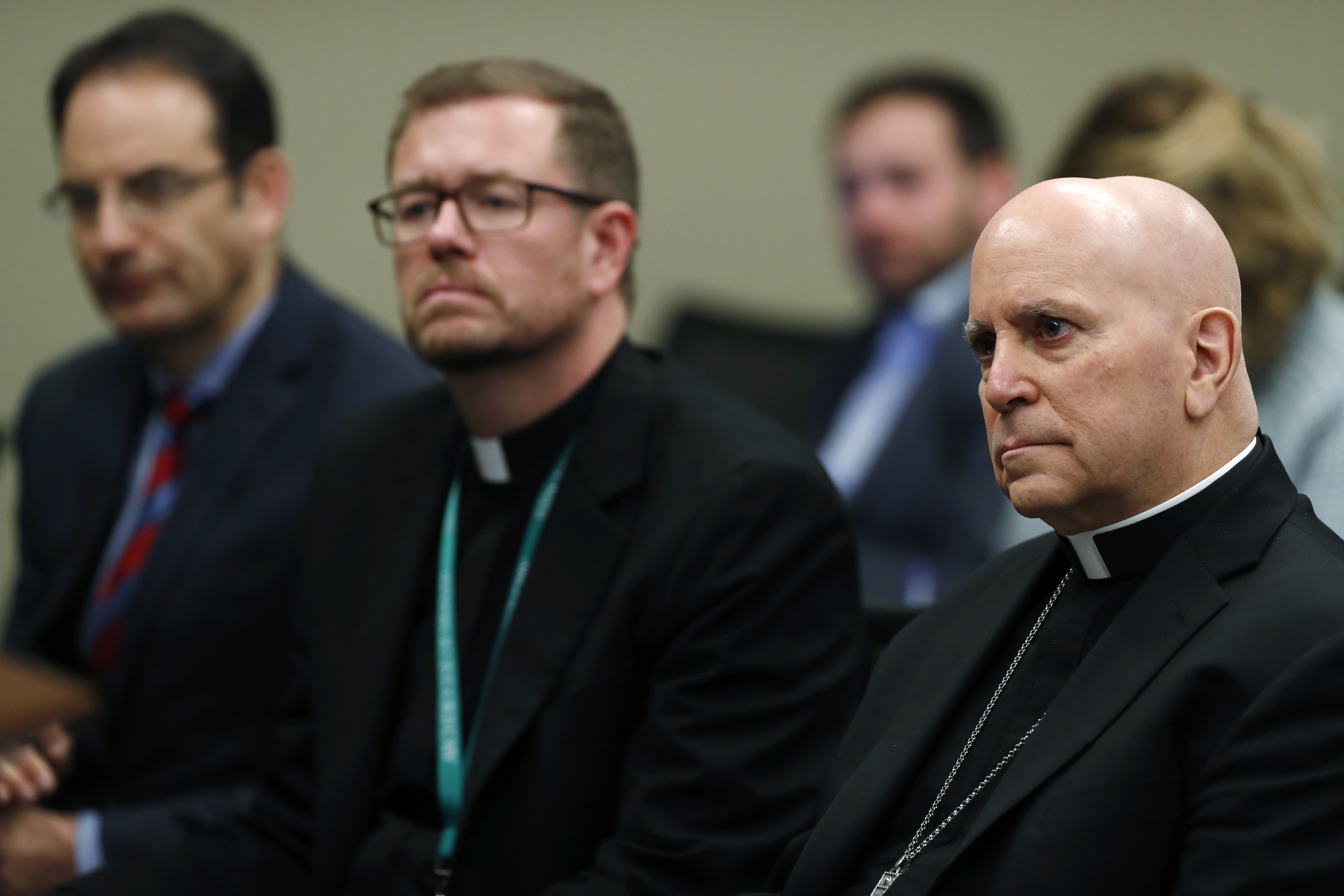 Phil Weiser, Samuel Aquila, Randy Dollins catholic church abuse colorado