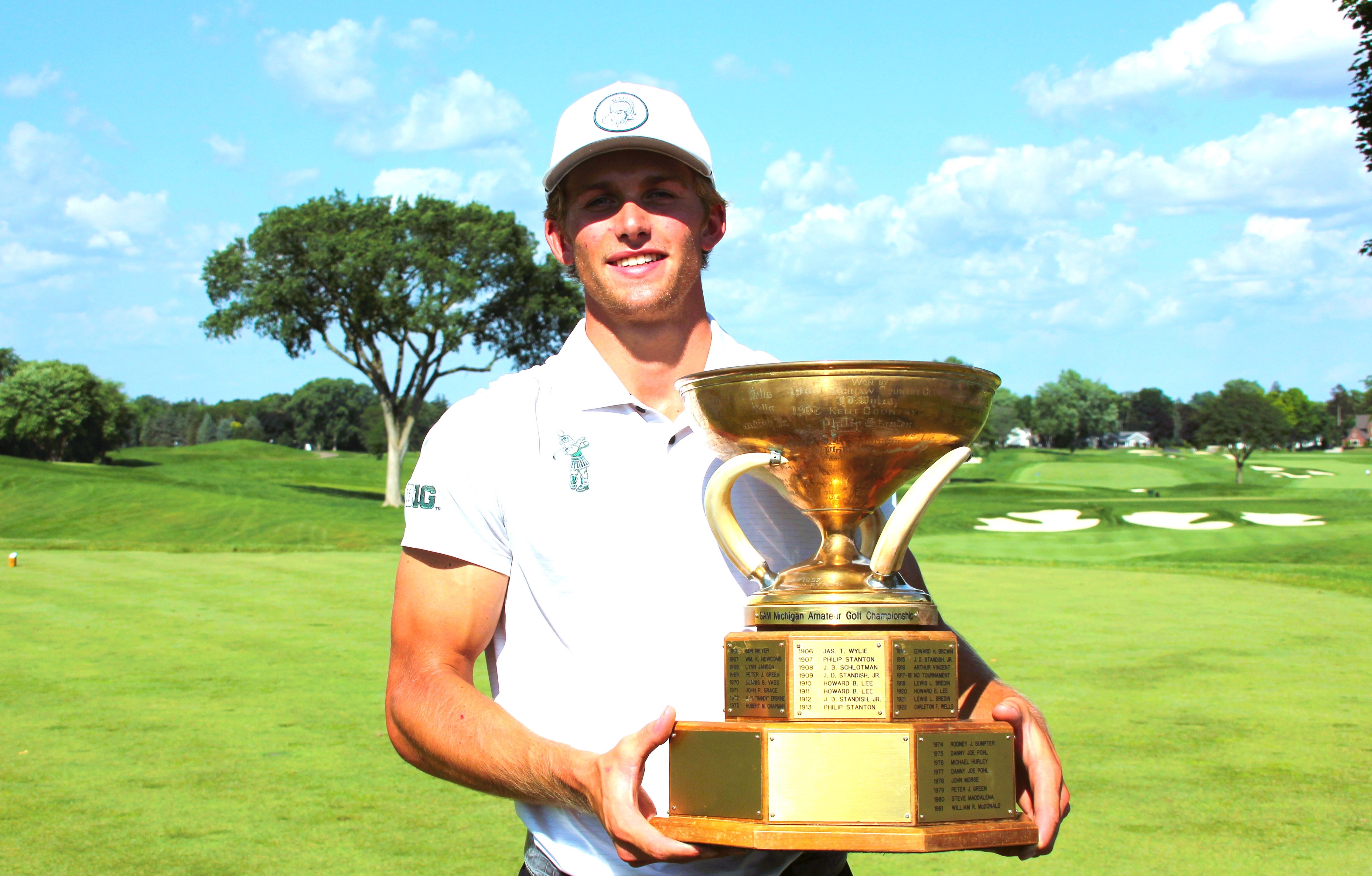2023 Michigan Amateur - Champion August Meekhof with the Staghorn Trophy.JPG