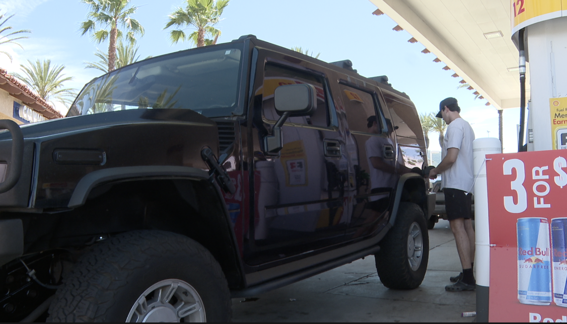 Isaiah Barros is filling up his Hummer in San Marcos. 