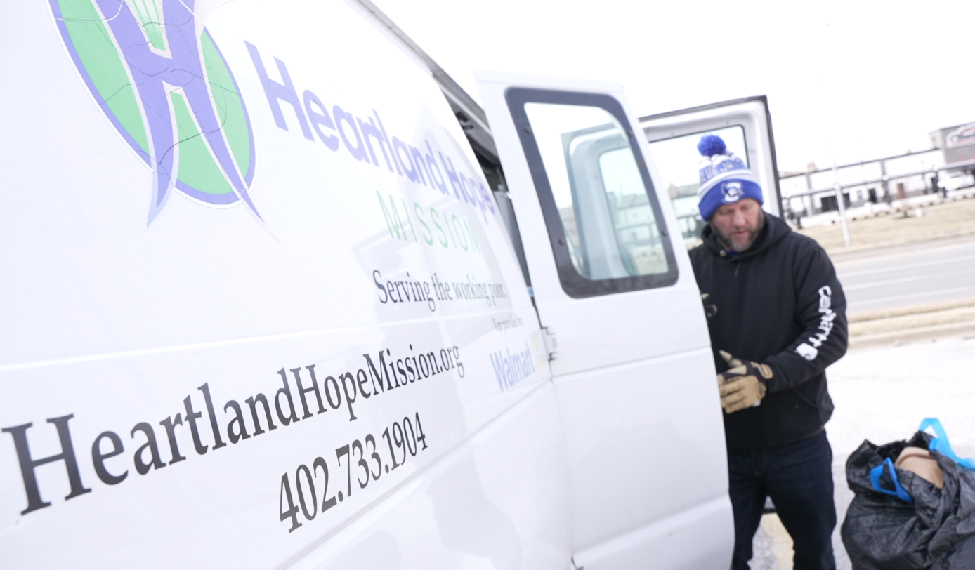 Heartland Hope Mission crews collect coats at Godfather's Pizza near 108th and Maple in Omaha.