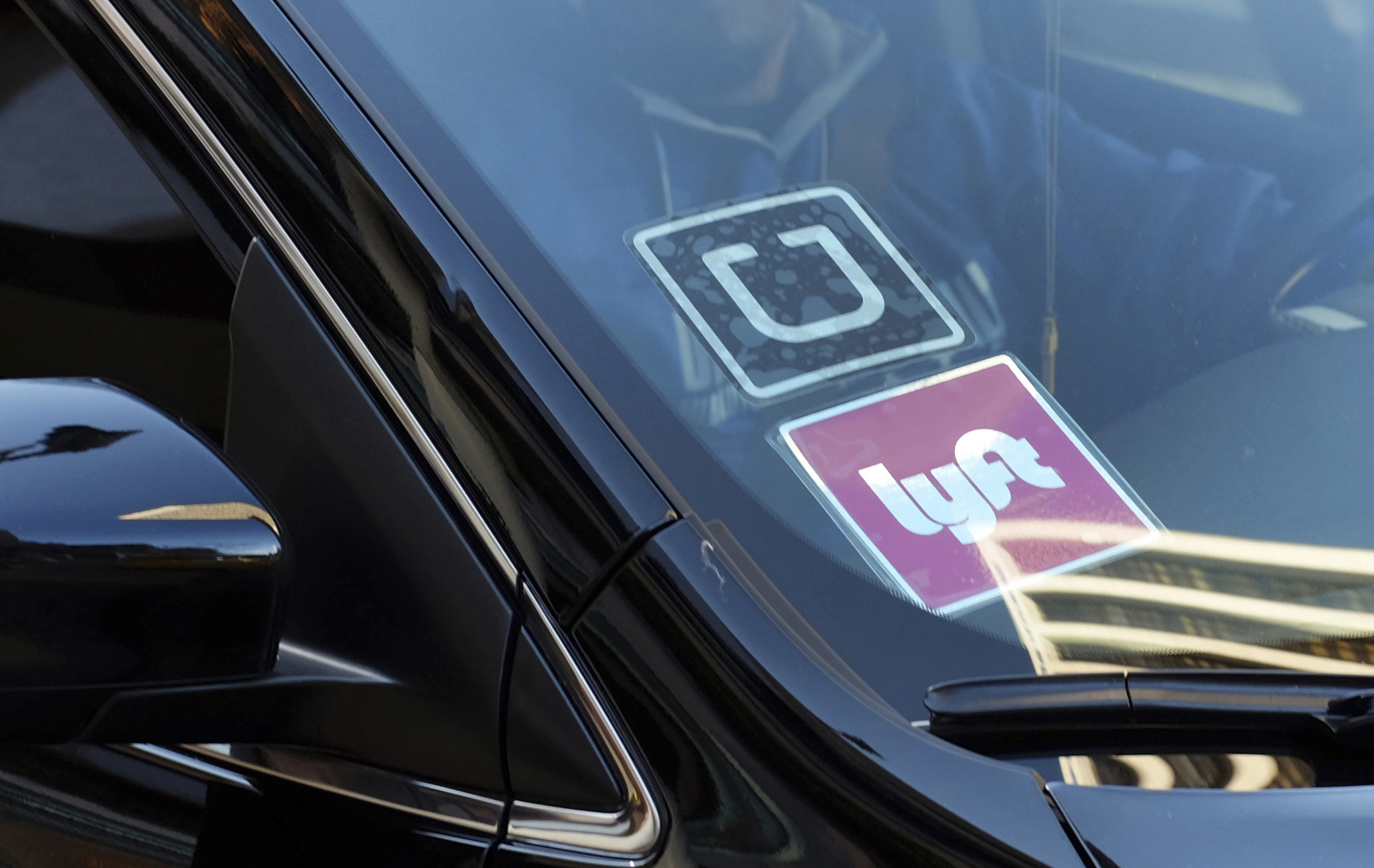 Uber, Lyft warn California riders they will shut down at 11:59 p.m. Thursday