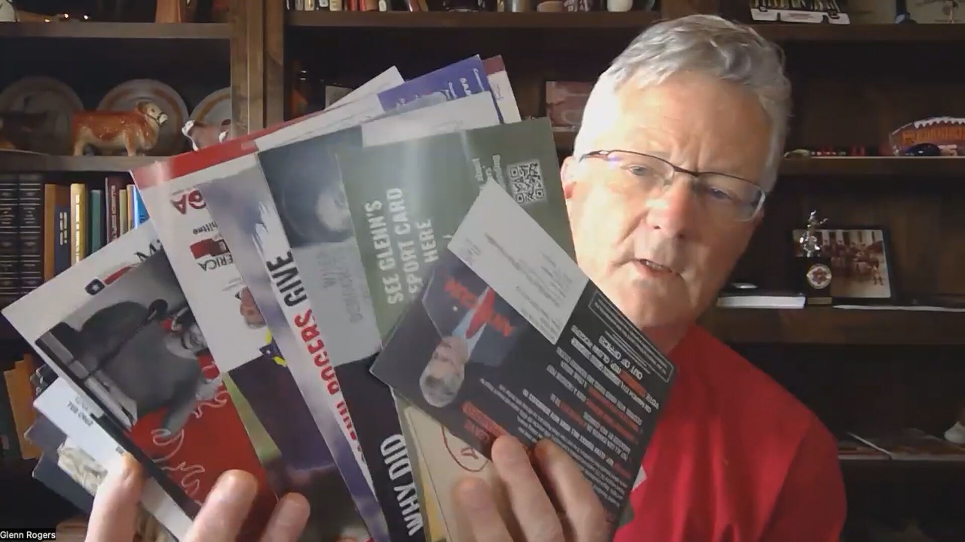 Rep Glenn Rogers Shows Attack Mailers.jpeg