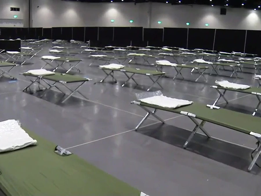 convention_center_migrant_children_beds.jpg