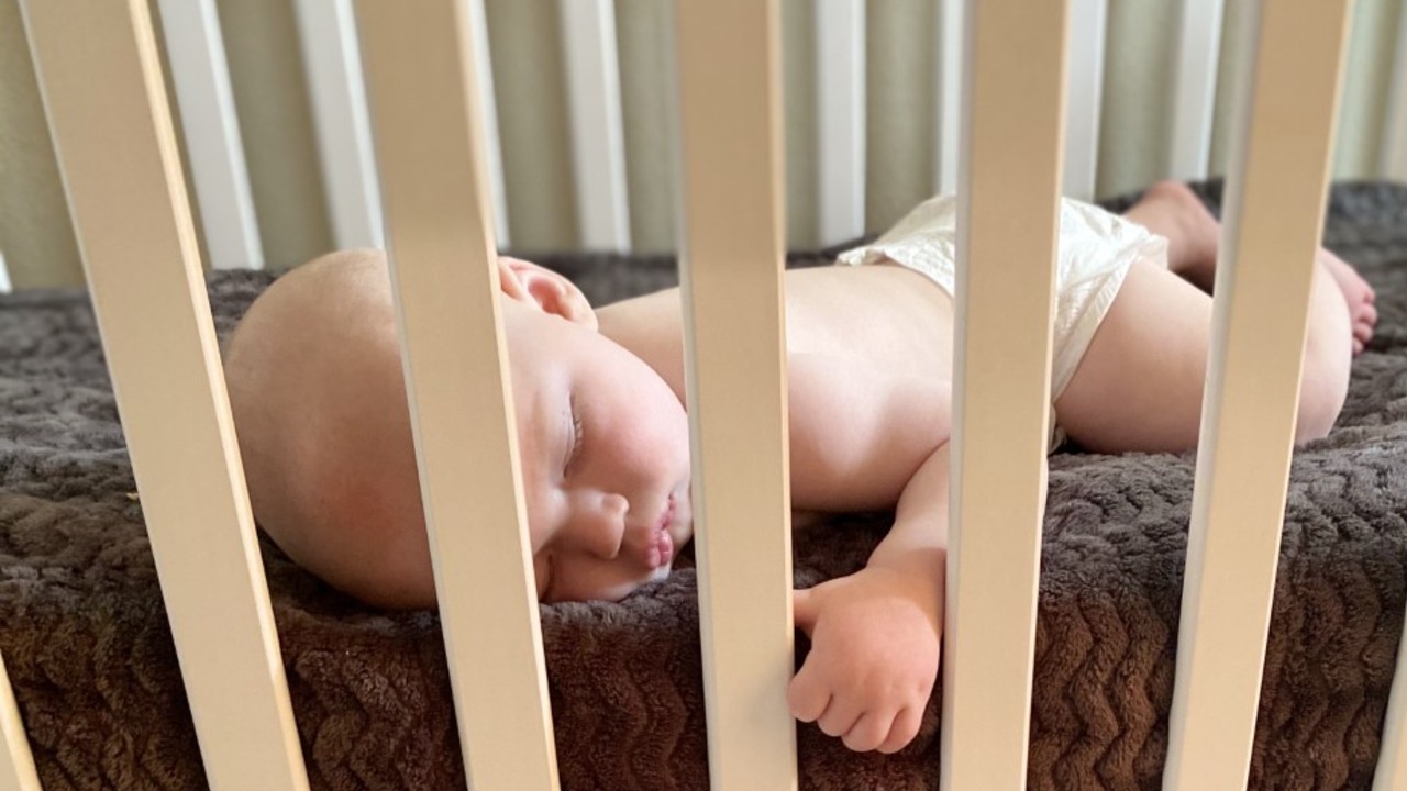 Sleeping in crib.jpg