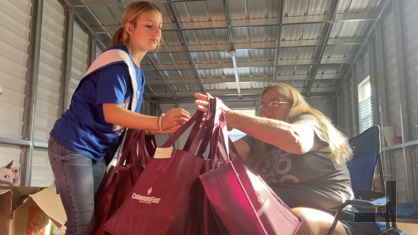 Kelsee Bishop supported by family and friends 