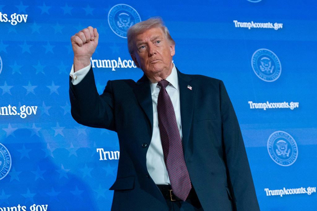 President Donald Trump waves to the crowd after speaking during the launch of a program known as Trump Accounts at the Andrew W. Mellon Auditorium, Wednesday, Jan. 28, 2026, in Washington. 