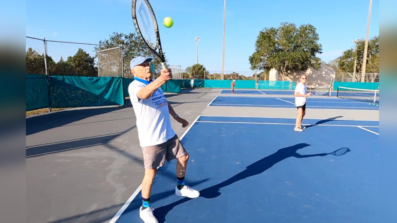 Tennis player serving up inspiration at age 100