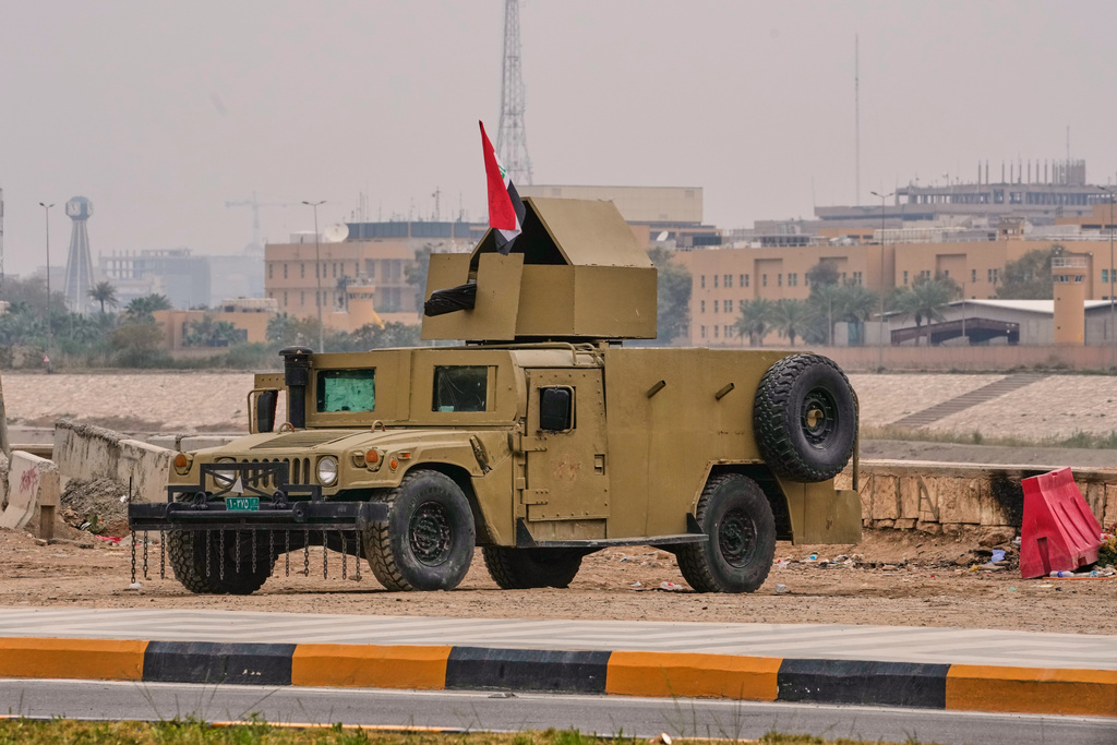 An Iraqi army armoured humvee vehicle is deployed near the banks of the Tigris River to protect the U.S. Embassy fortified "Green Zone" in Baghdad, Saturday, March 14, 2026.