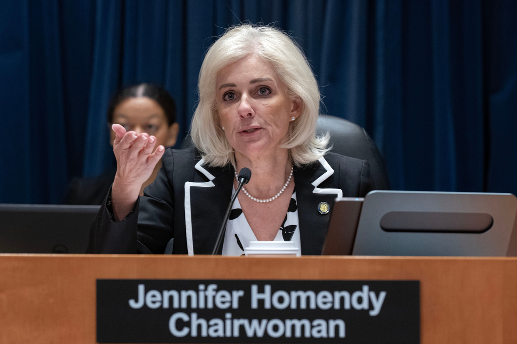 National Transportation Safety Board (NTSB) Chairwoman Jennifer Homendy presides over a NTSB hearing on the midair aircraft collision that killed 67 people near Washington Reagan National Airport, in Washington, Tuesday, Jan. 27, 2026.