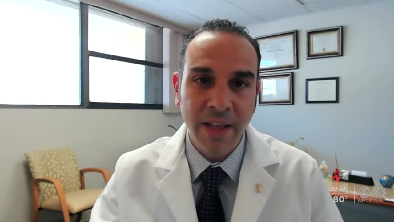 Dr. Samer Fahmy, the chief medical officer at Boca Raton Regional Hospital, speaks to WPTV on July 28, 2021.jpg