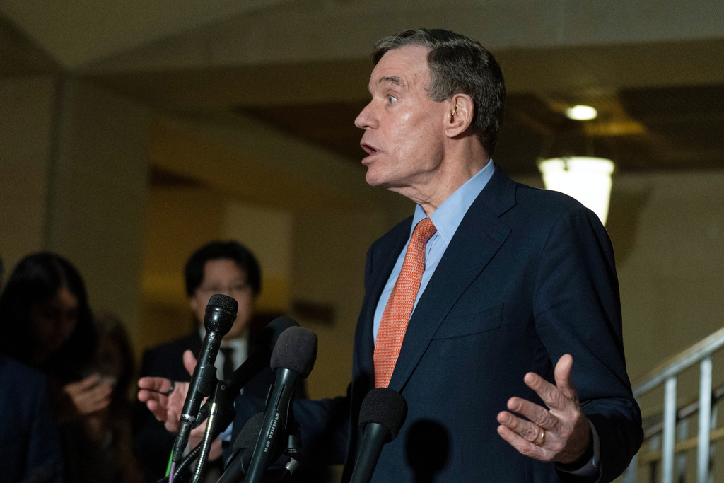 Senate Intelligence Committee Sen. Mark Warner, D-Va., speaks to reporters following a House and Senate Intelligence Committees briefing about the war in Iran at the Capitol in Washington, Monday, March 2, 2026.