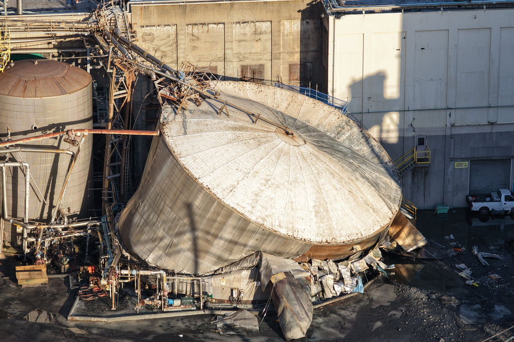 Damage is seen at Nippon Dynawave Packaging Co., after a tank containing hazardous liquid imploded, on Tuesday, May 26, 2026, in Longview, Wash.