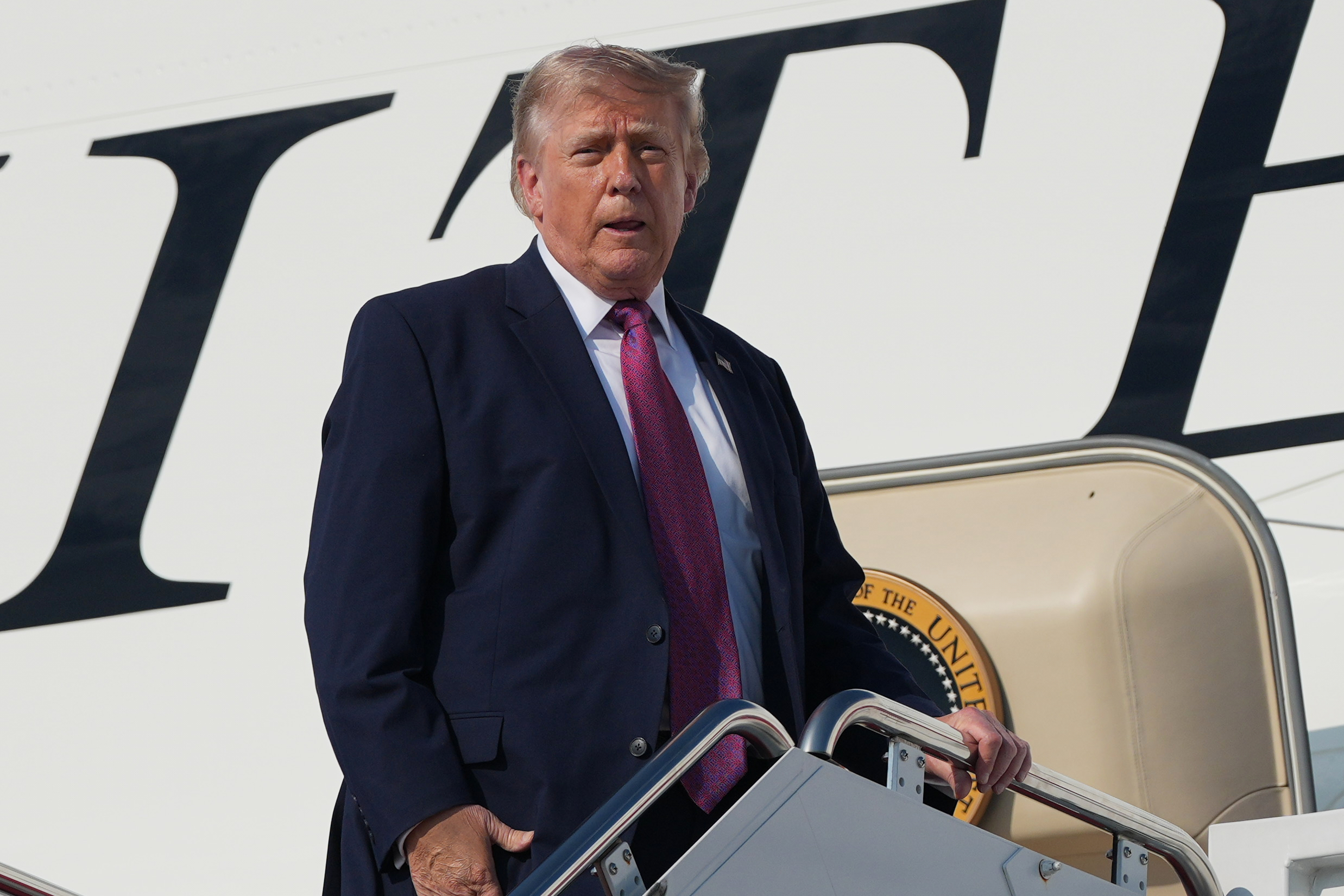 President Donald Trump boards Air Force One, Friday, July 3, 2026, at Joint Base Andrews, Md. , for a trip to Mt. Rushmore. 