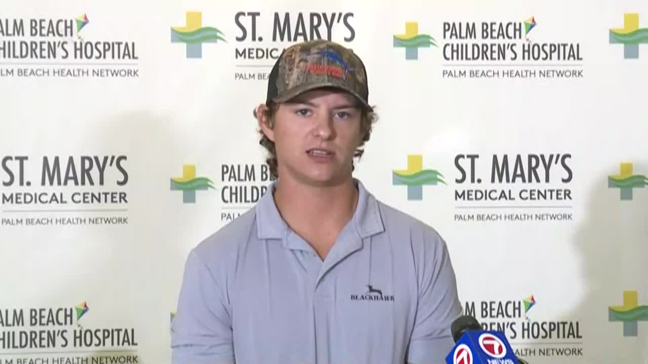 Shark bite victim Marlin Wakeman, 24, speaks at St. Mary's Medical Center in West Palm Beach on May 9, 2024.jpg