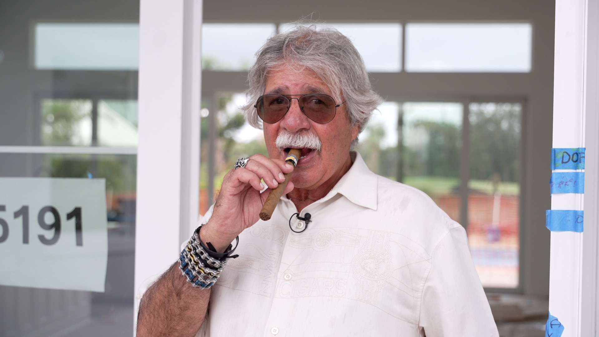 Standing outside his newly rebuilt home in Martin County, George Bustillo lights a cigar — it now symbolizes his survival.  One year after Hurricane Milton, the cigar he was found buried with has become his reminder of resilience and gratitude.