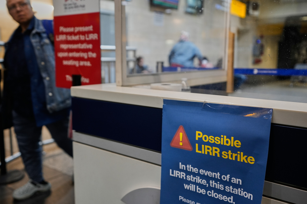 A sign warns commuters of a potential Long Island Rail Road strike at Penn Station in New York, Thursday, May 14, 2026. 