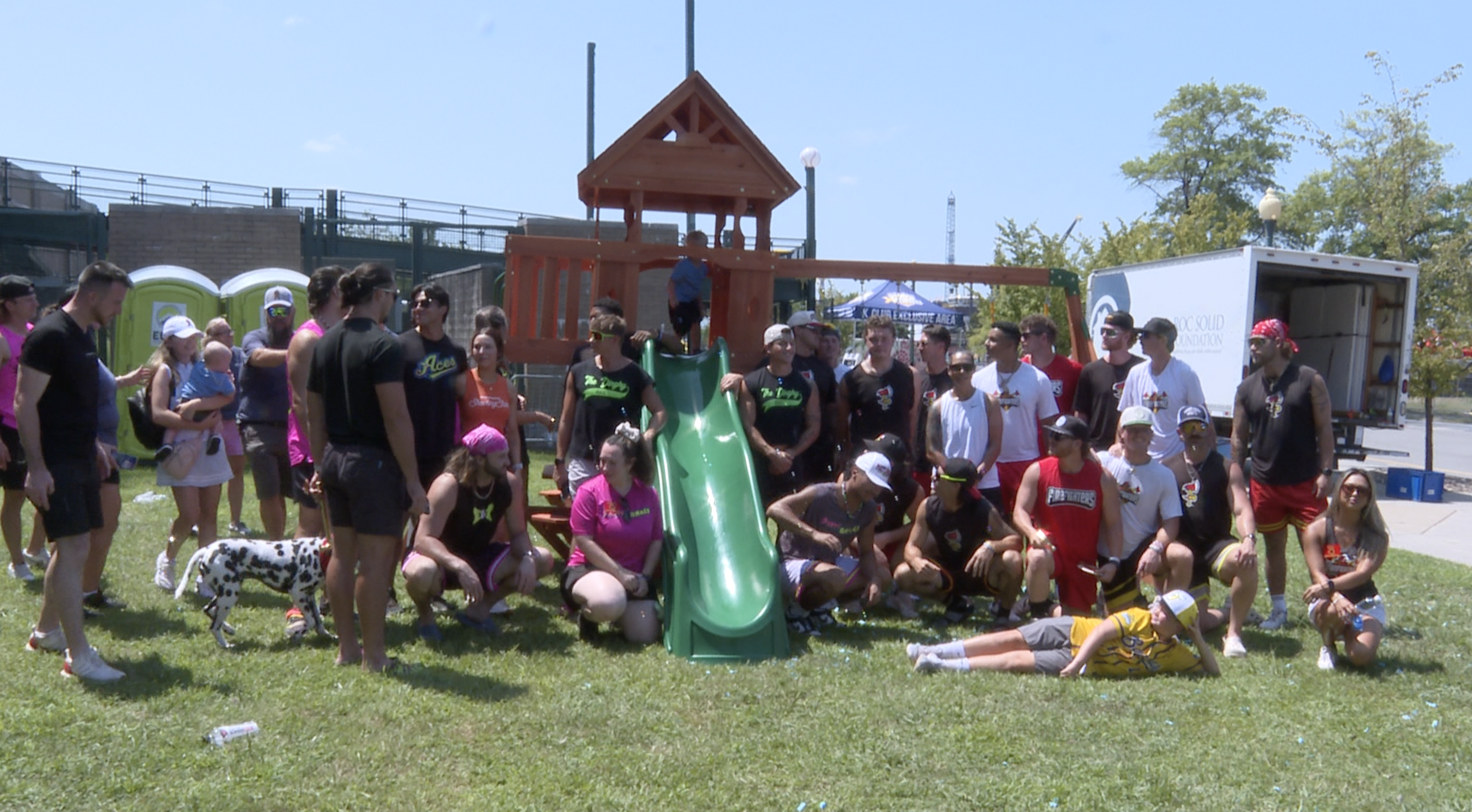 Banana Ball players build playset for local boy fighting cancer
