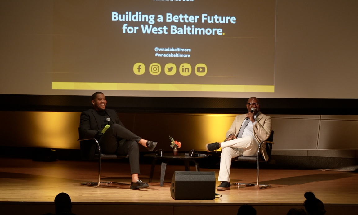 Williams addressing the crowd at the State of West North Avenue event