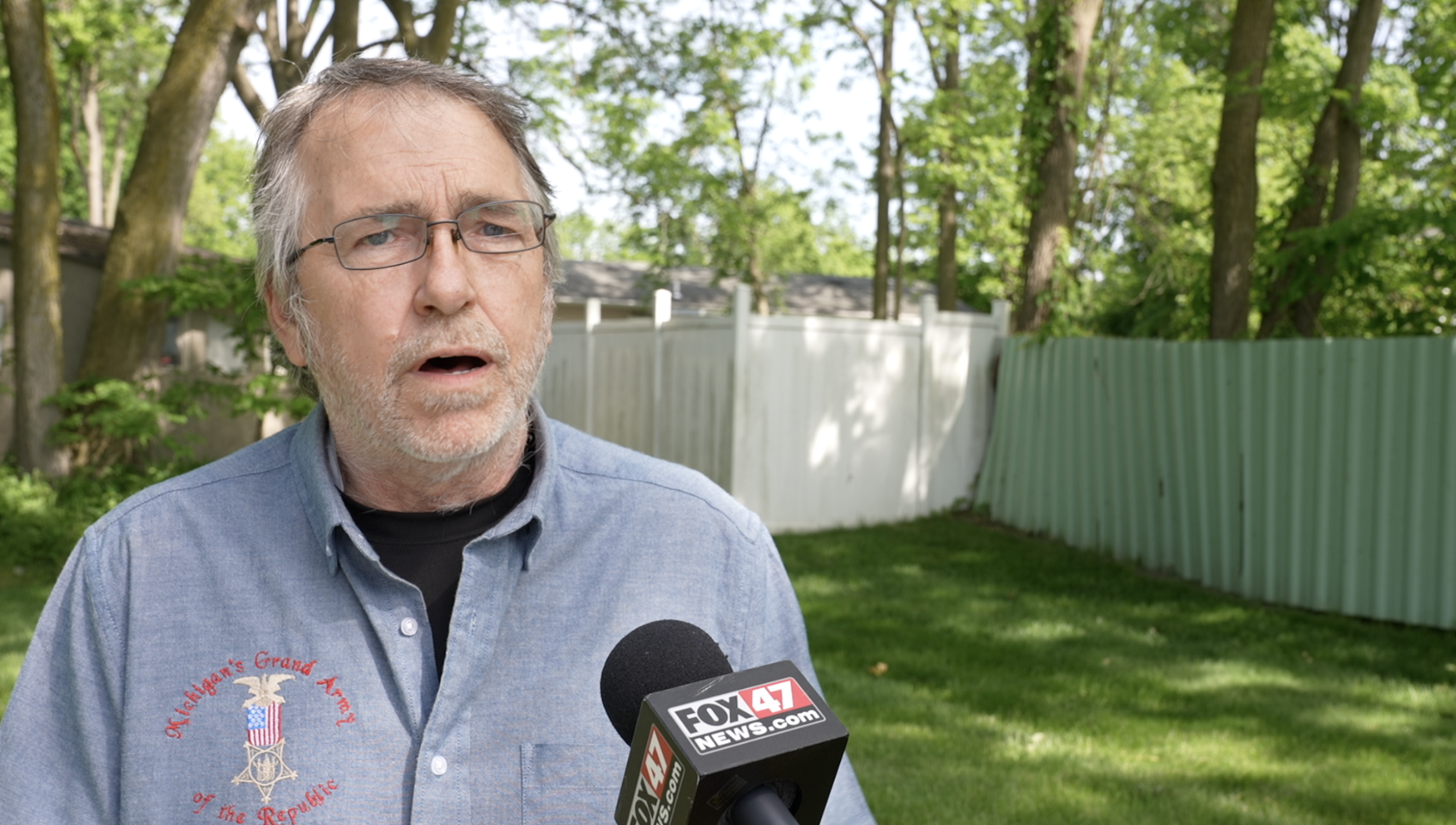 Director Chris Allen explains new artifacts at the Grand Army Museum 