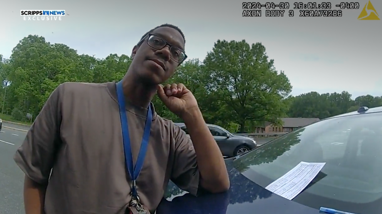 Brian J. Cole, Jr., speaking with police after a 2024 vehicle crash. 