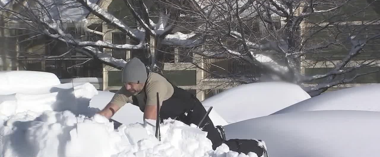Man in snow in California