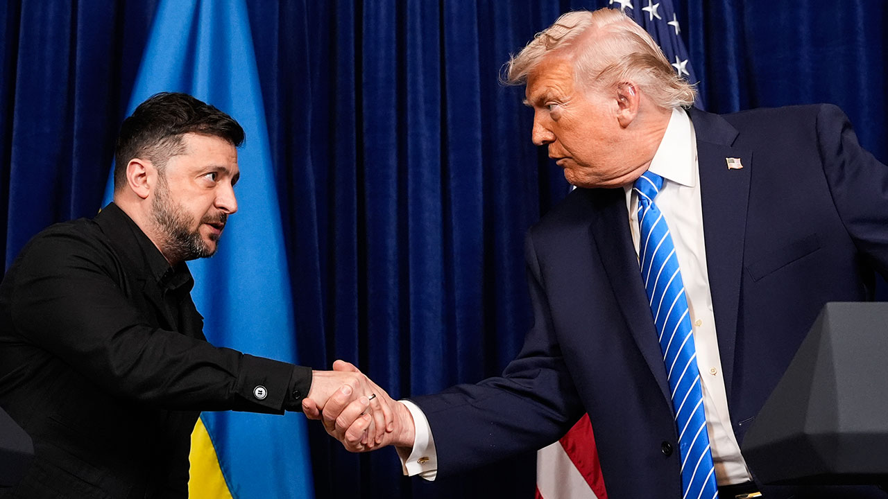 President Donald Trump and Ukraine's President Volodymyr Zelenskyy shake hands at the start of a joint news conference following a meeting at Trump's Mar-a-Lago club, Sunday, Dec. 28, 2025, in Palm Beach, Fla. 