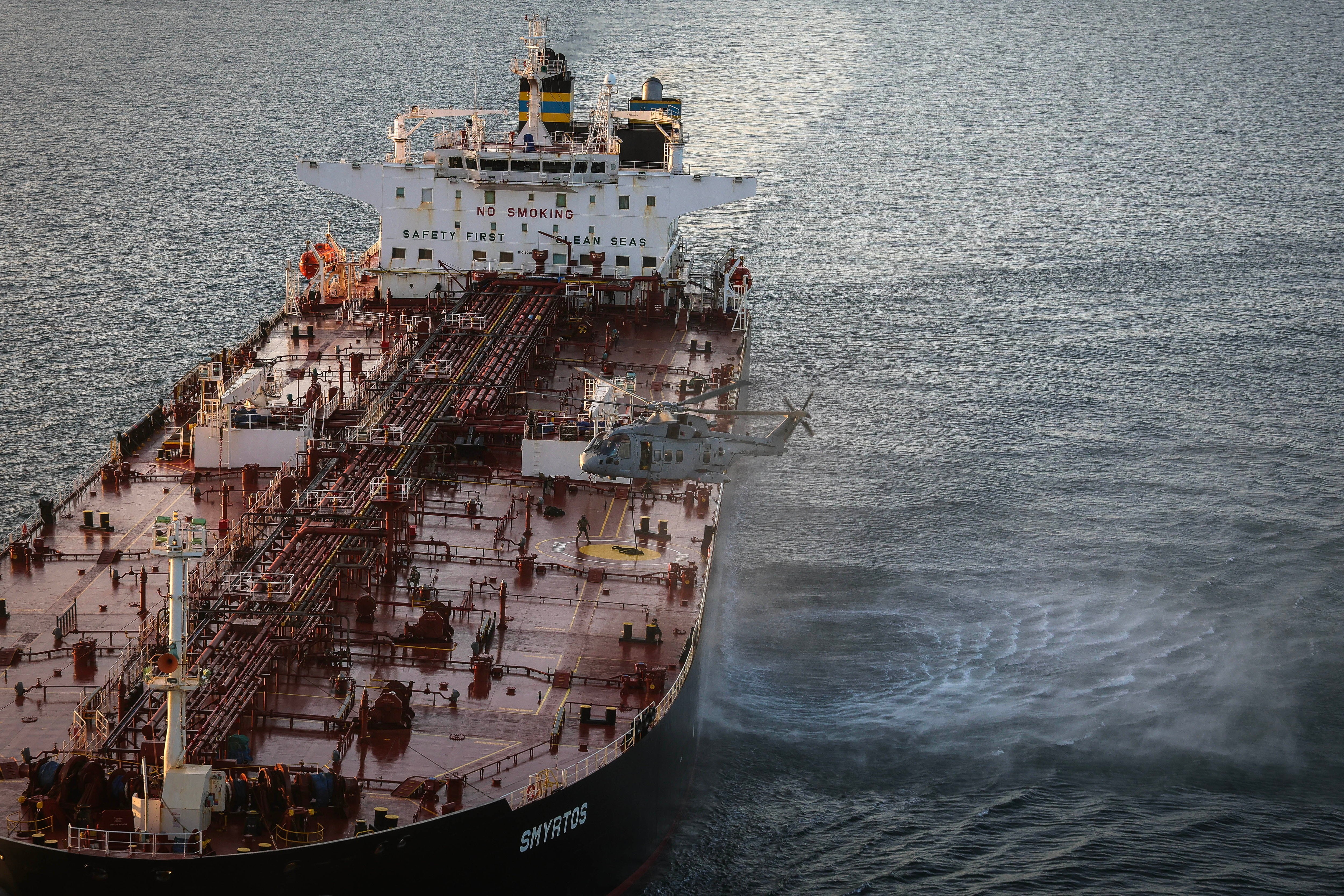 In this photo provided by the Royal Navy, Royal Marine Commandos detain sanctioned tanker, the Smyrtos, in the English Channel, Sunday, June 14, 2026.