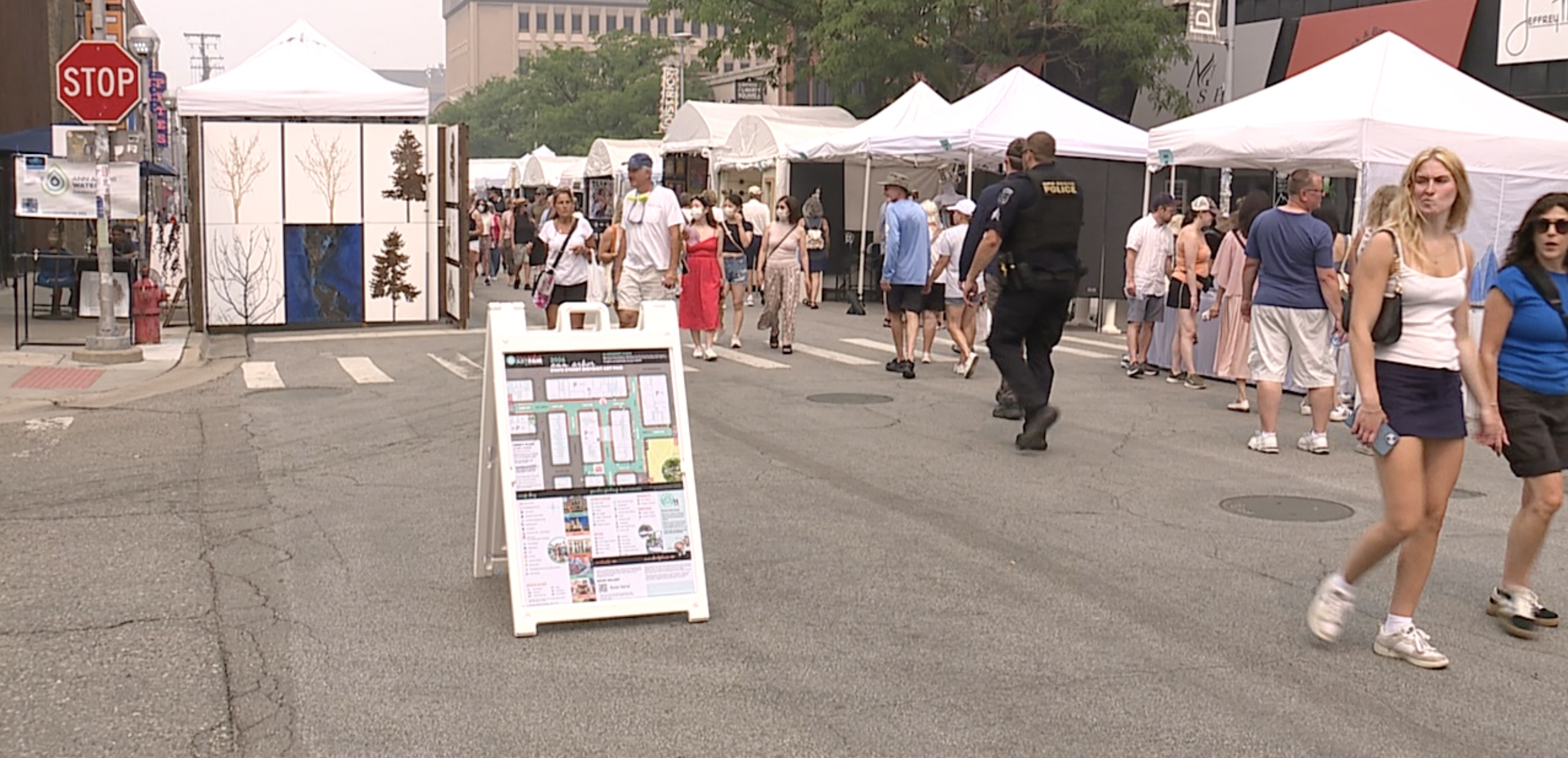 Smoky skies from Canadian and Minnesota wildfires don't stop crowds at Ann Arbor Art Fair