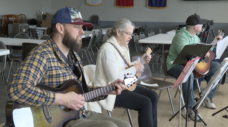Vets playing guitar