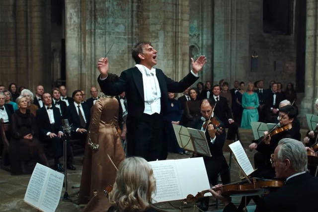 Bradley Cooper conducting as Leonard Bernstein in 'Maestro'