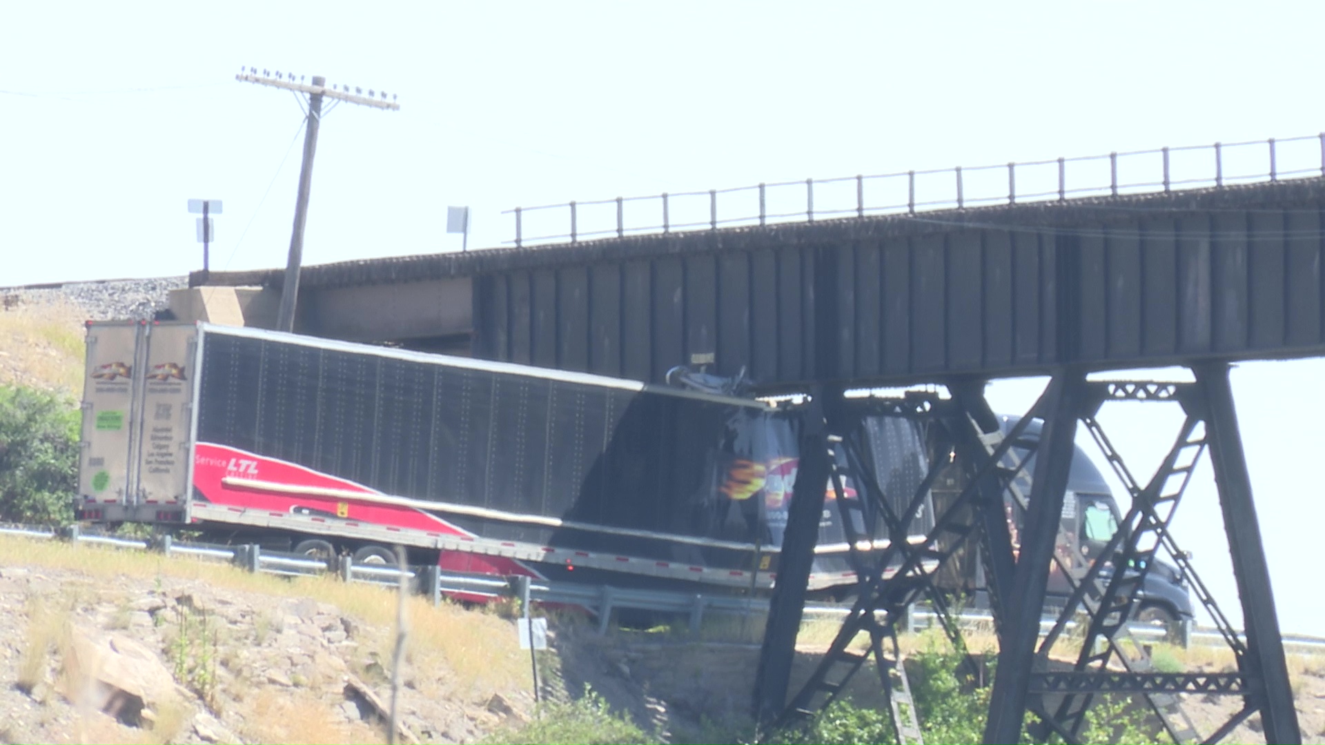 Truck stuck under overpass in Great Falls (August 15, 2023)