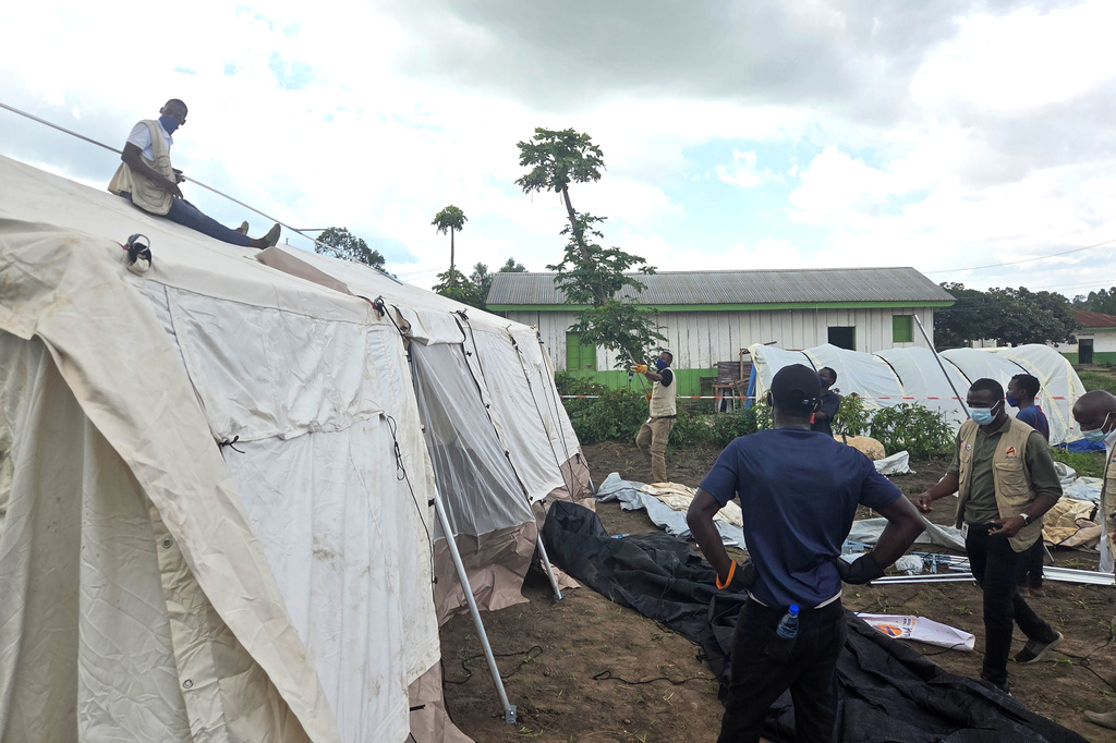 Aid workers set up an Ebola treatment center in Bunia, Congo, Tuesday, May 19, 2026. 