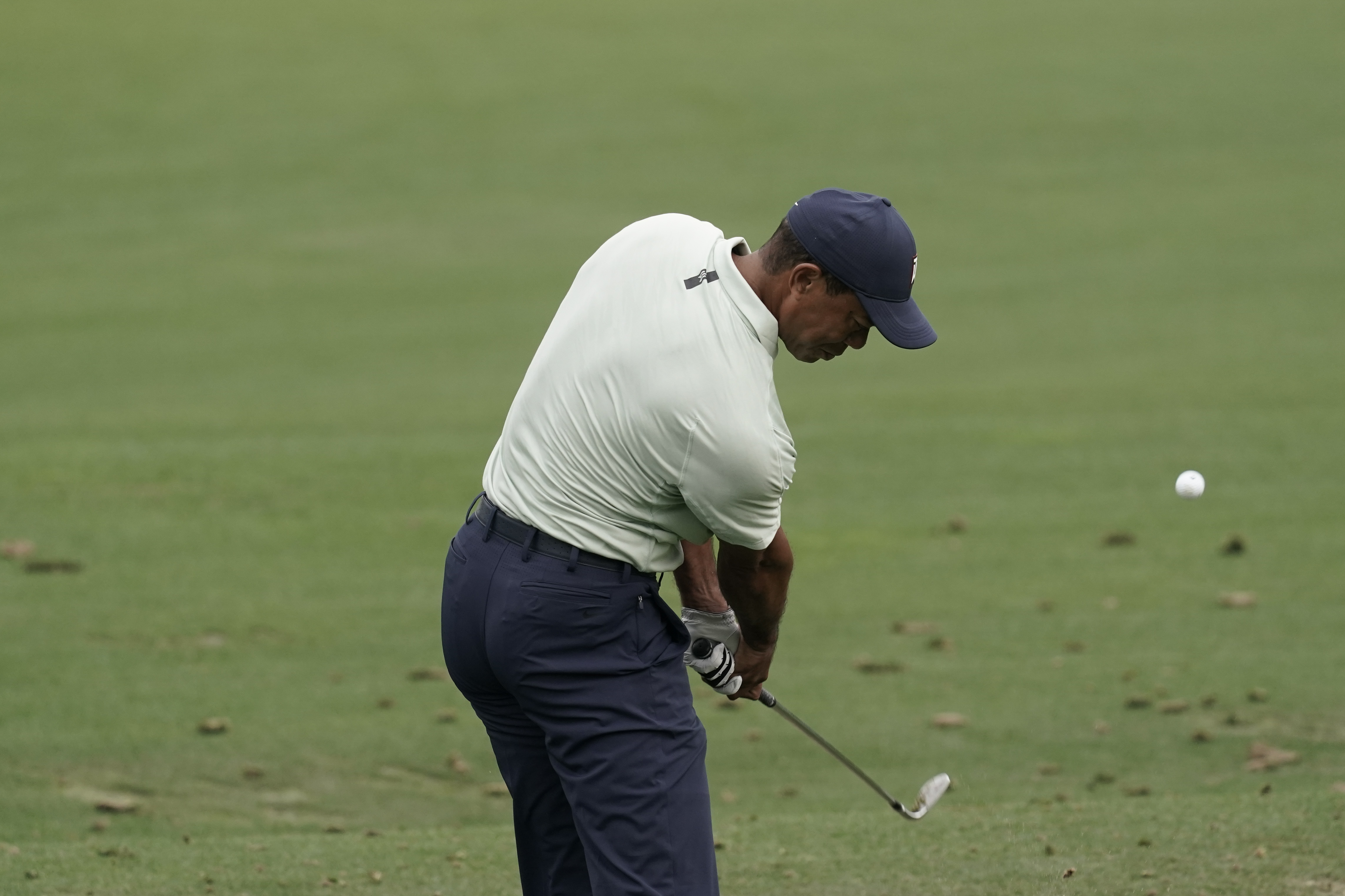 Tiger Woods hits on driving range at Masters, April 5, 2022