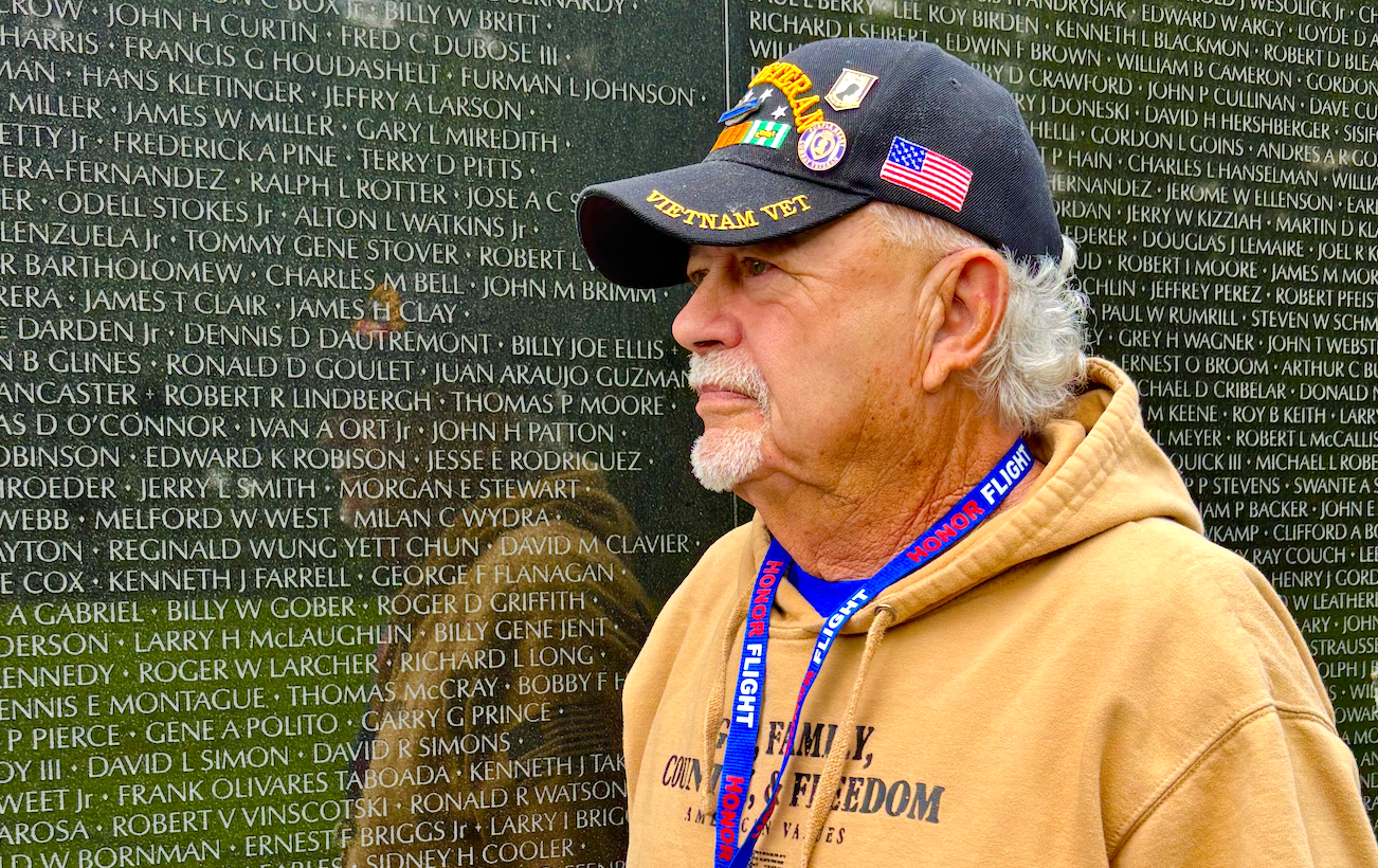 Vietnam veteran visits the memorial wall on the 58th anniversary of the day he was shot in combat. (Photo Taken By Jill Hammons)