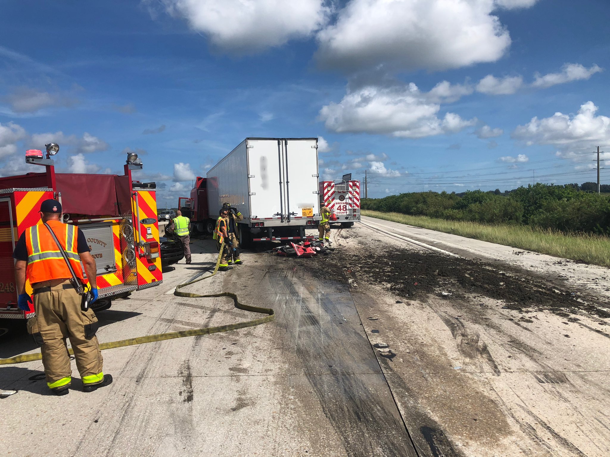 A crash involving a tractor trailer and a dump truck left cow manure over a portion of Interstate 95.