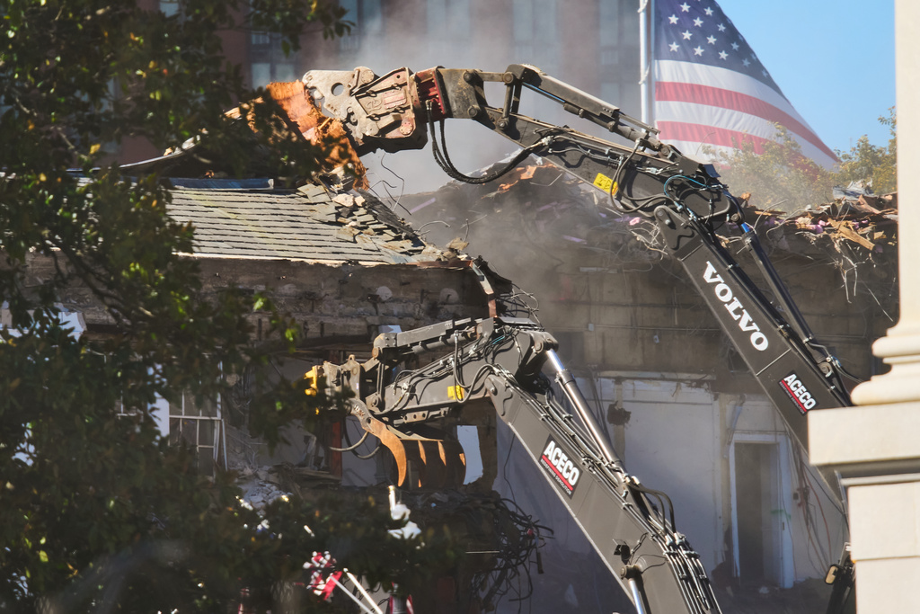 Work continues on the demolition of a part of the East Wing of the White House, Tuesday, Oct. 21, 2025, in Washington, before construction of a new ballroom.