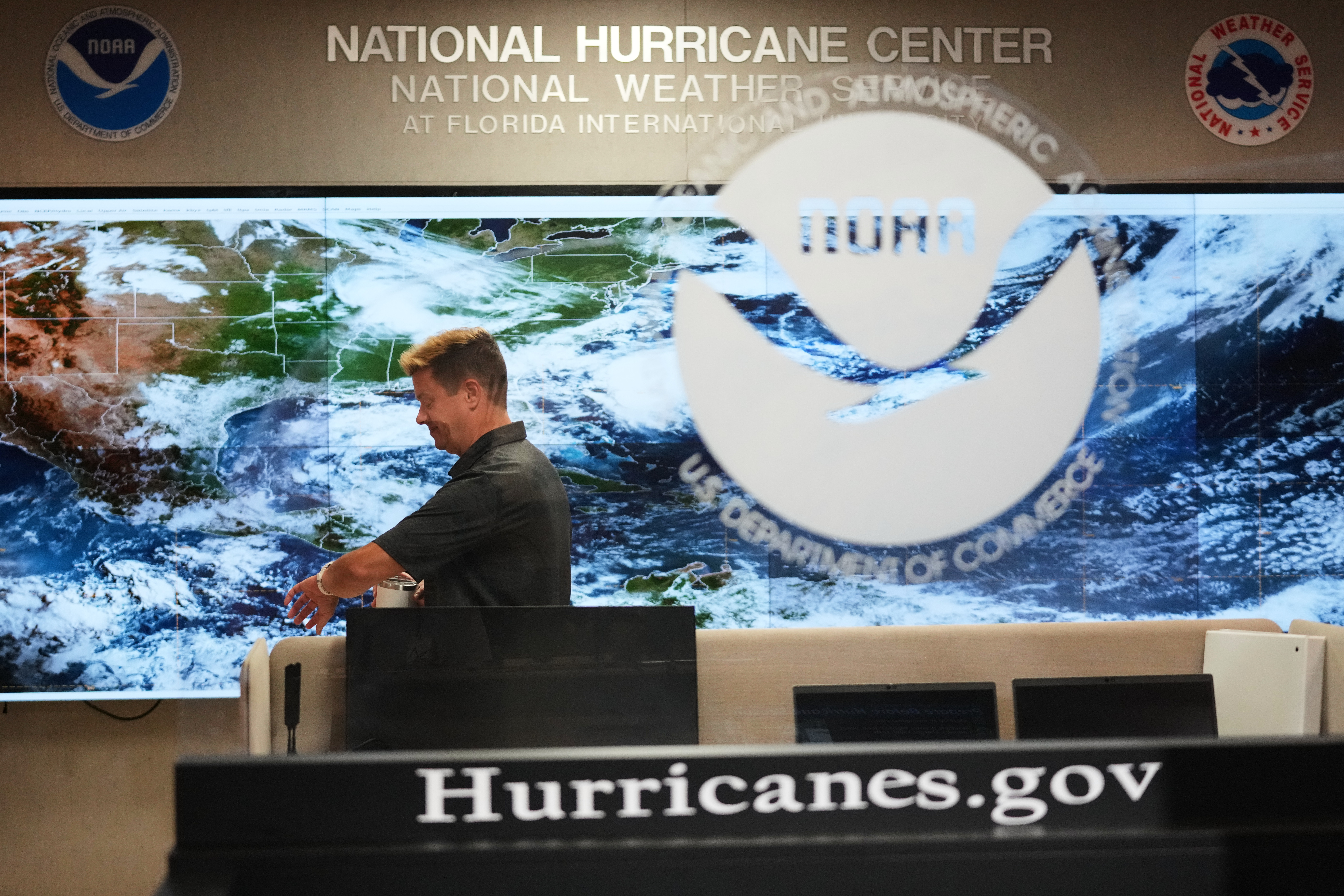 Robbie Berg, Warning Coordinator Meteorologist, works at the National Hurricane Center on the first day of hurricane season, Monday, June 1, 2026, in Miami.