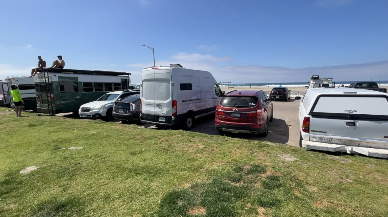 vans parked near ocean beach
