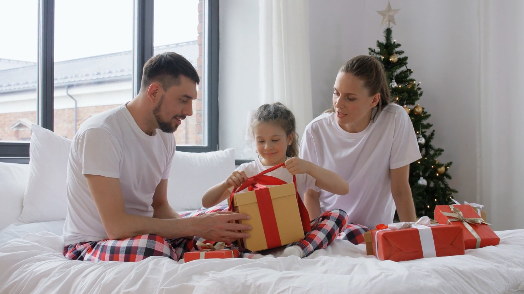 Opening gifts Christmas morning