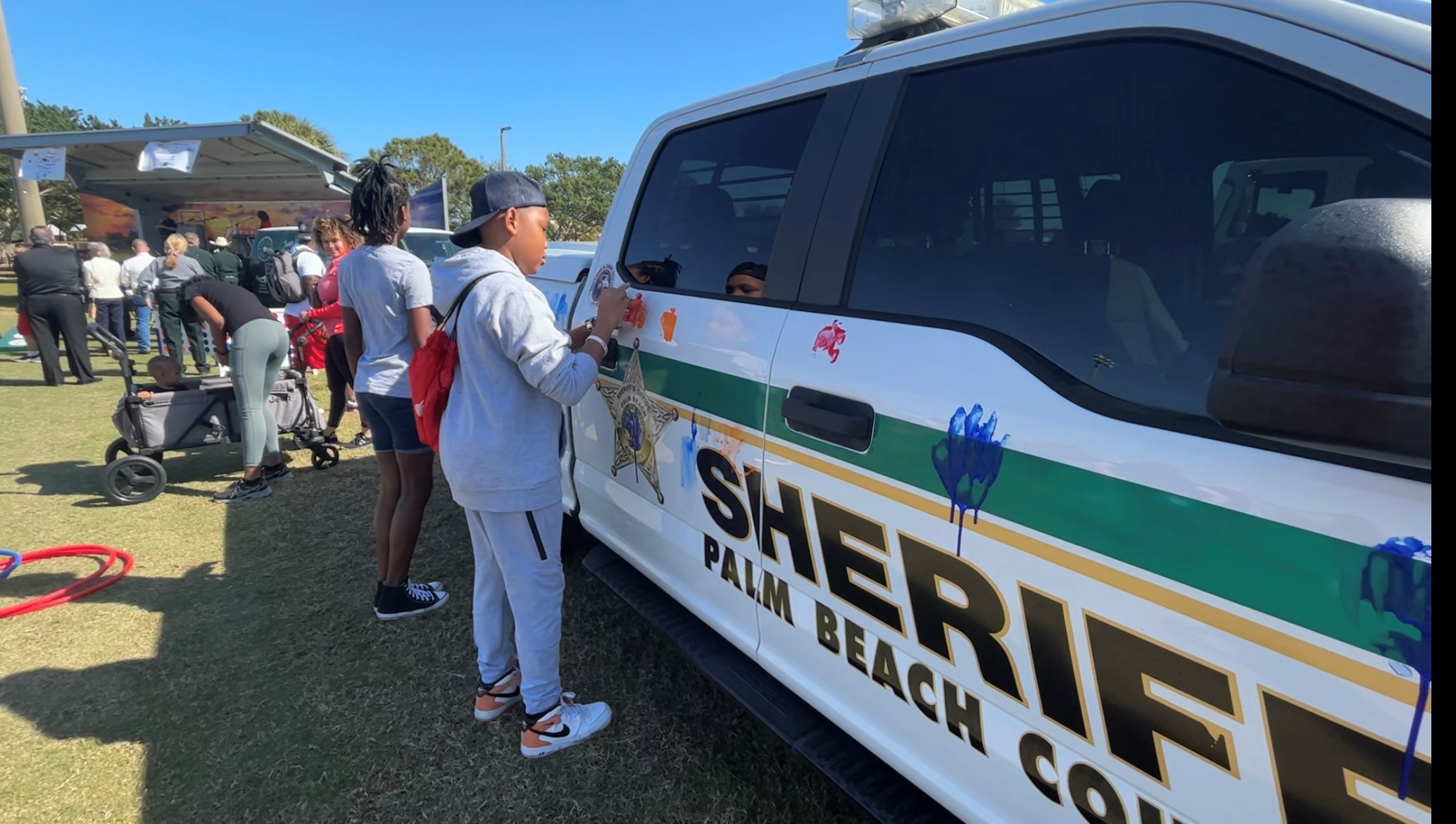 People display messages on PBSO cruiser at autism event in Wellington. Feb. 25, 2024.jpg