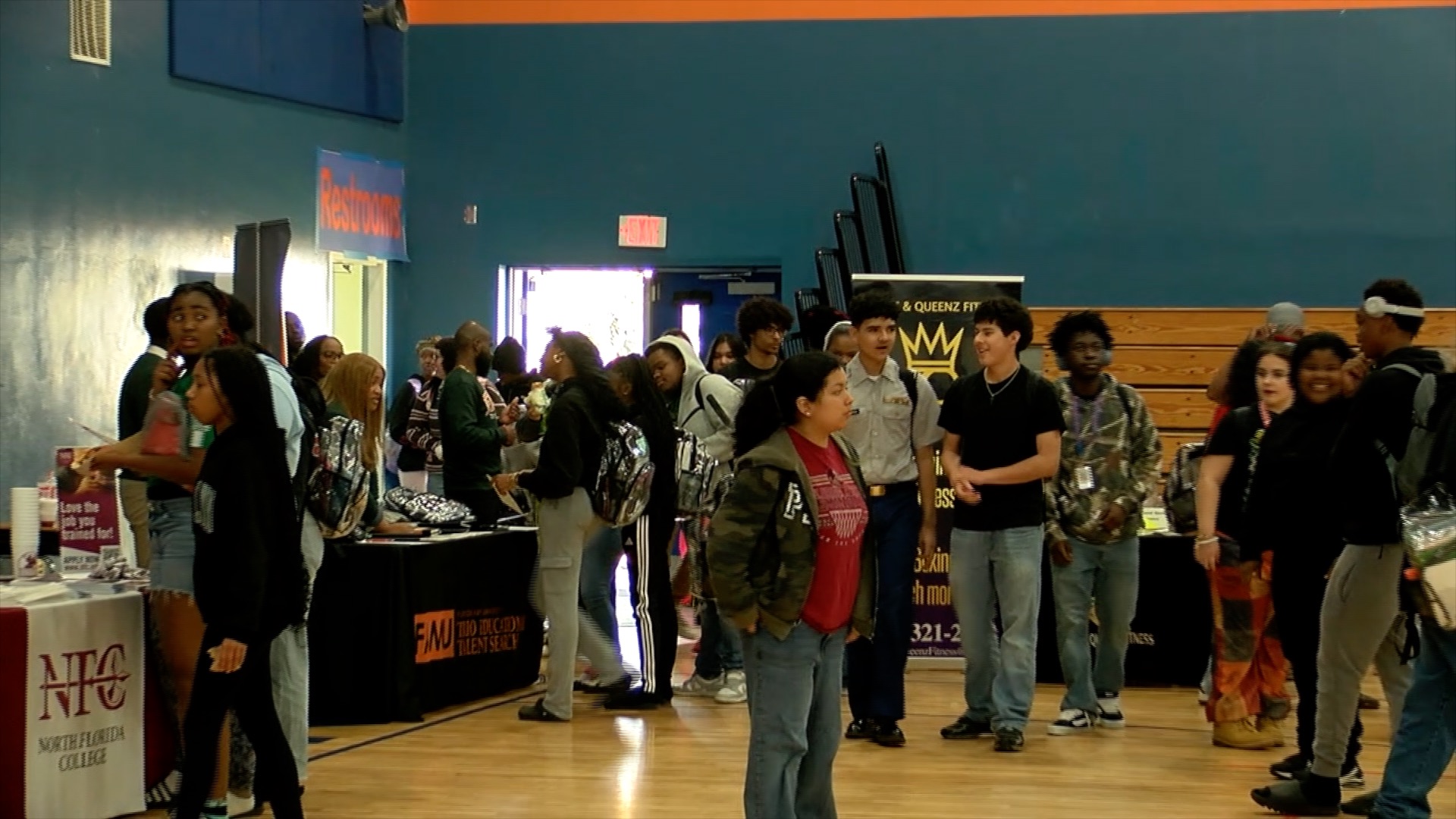 Students entering the gym for the fair.jpg