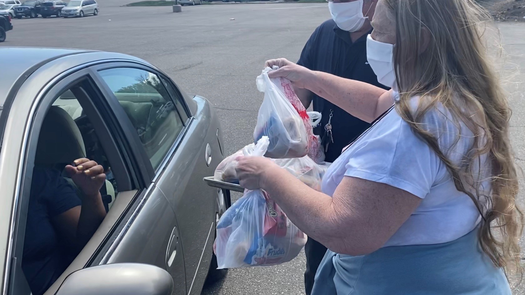Volunteers deliver food to families in Cherry Creek School 