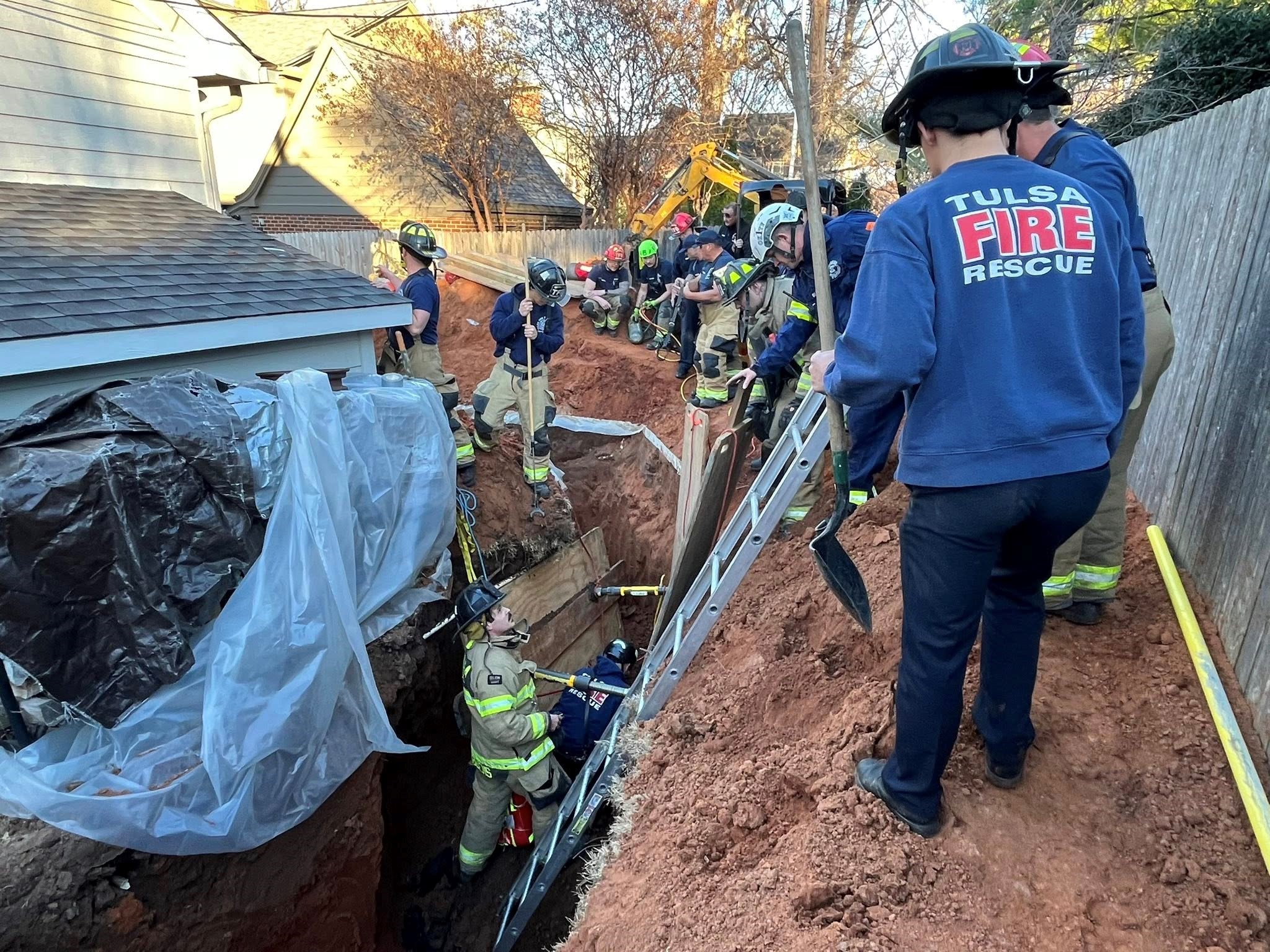 TFD rescues man in trench.jpg